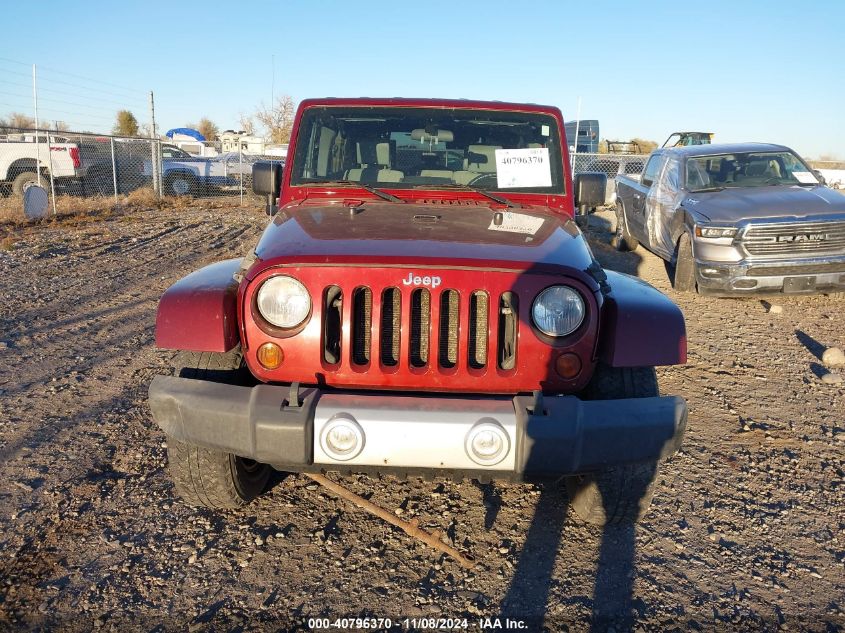 2010 Jeep Wrangler Unlimited Sahara VIN: 1J4HA5H16AL156371 Lot: 40796370