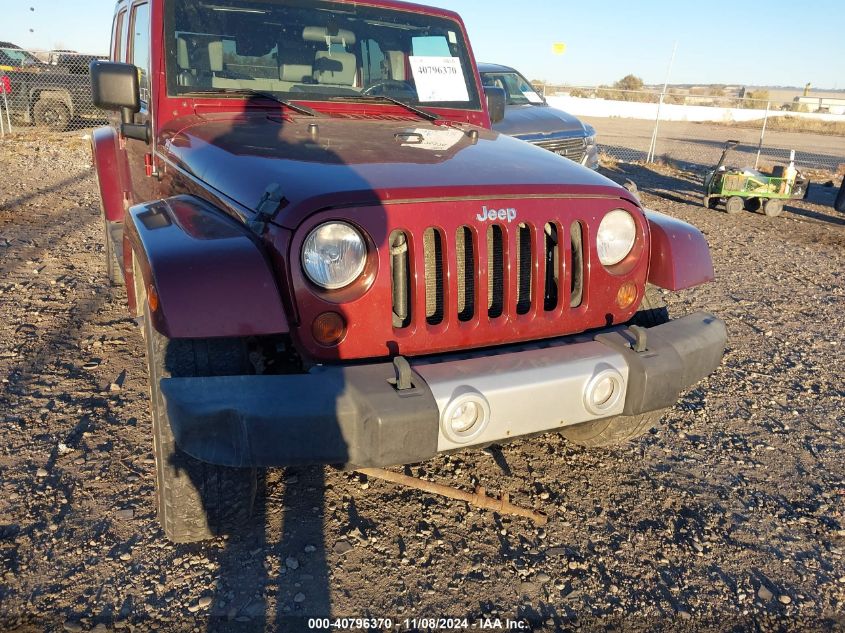 2010 Jeep Wrangler Unlimited Sahara VIN: 1J4HA5H16AL156371 Lot: 40796370