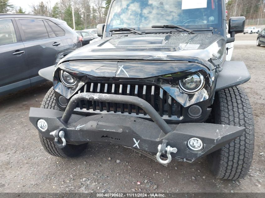 2015 Jeep Wrangler Unlimited Altitude VIN: 1C4BJWEG1FL771749 Lot: 40798632