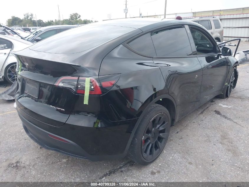 2023 Tesla Model Y Awd/Long Range Dual Motor All-Wheel Drive VIN: 7SAYGDEE4PA078206 Lot: 40799328