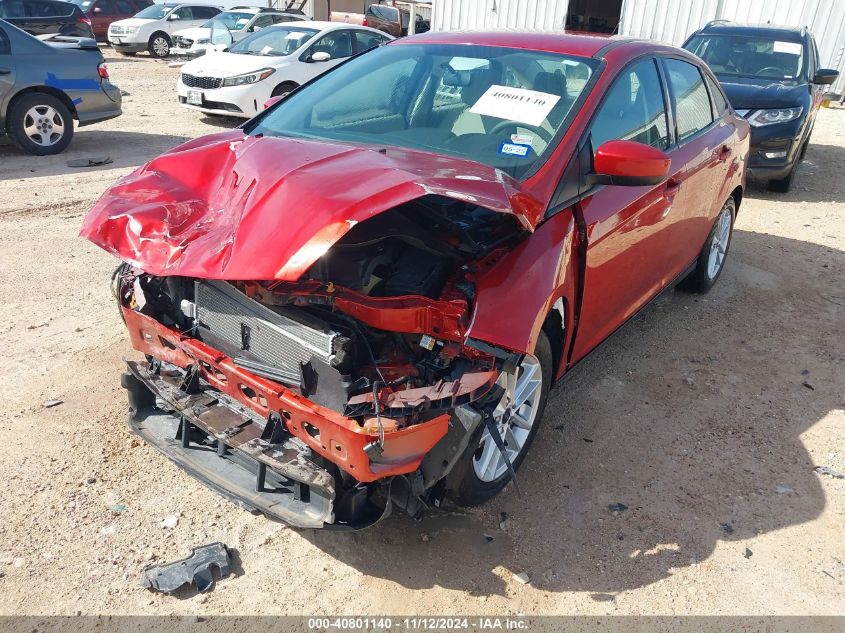 VIN 1FADP3FEXJL321843 2018 Ford Focus, SE no.18