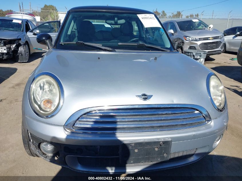 2009 Mini Cooper VIN: WMWMF33509TW71038 Lot: 40802432