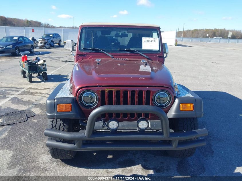 2002 Jeep Wrangler Sahara VIN: 1J4FA59SX2P712139 Lot: 40804371