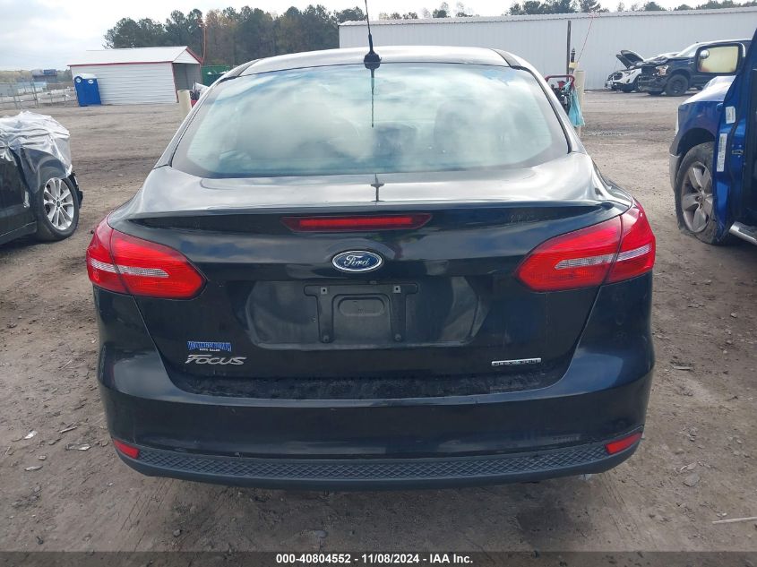 2015 Ford Focus S VIN: 1FADP3E20FL321493 Lot: 40804552