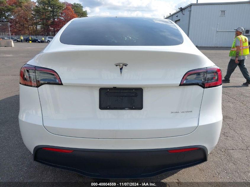 2023 Tesla Model Y Awd/Long Range Dual Motor All-Wheel Drive VIN: 7SAYGDEE3PF630734 Lot: 40804559