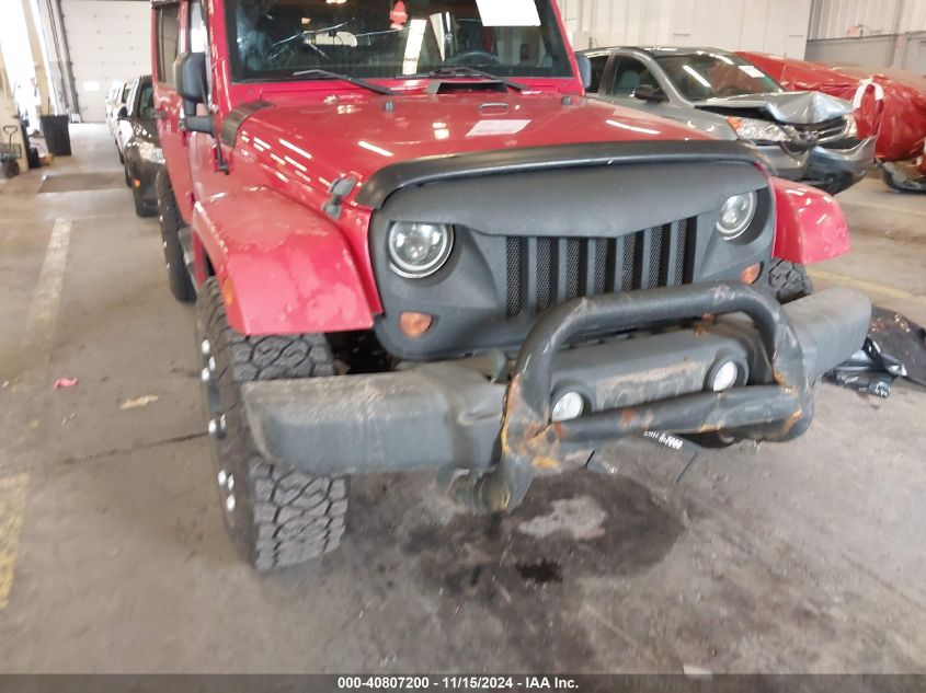 2011 Jeep Wrangler Unlimited Sahara VIN: 1J4HA5H17BL576562 Lot: 40807200