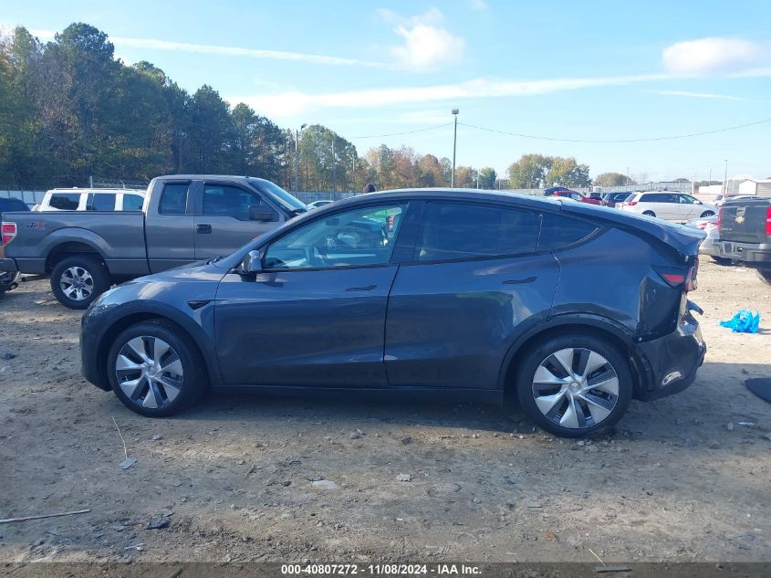 2023 Tesla Model Y Awd/Long Range Dual Motor All-Wheel Drive VIN: 7SAYGDEEXPA166953 Lot: 40807272