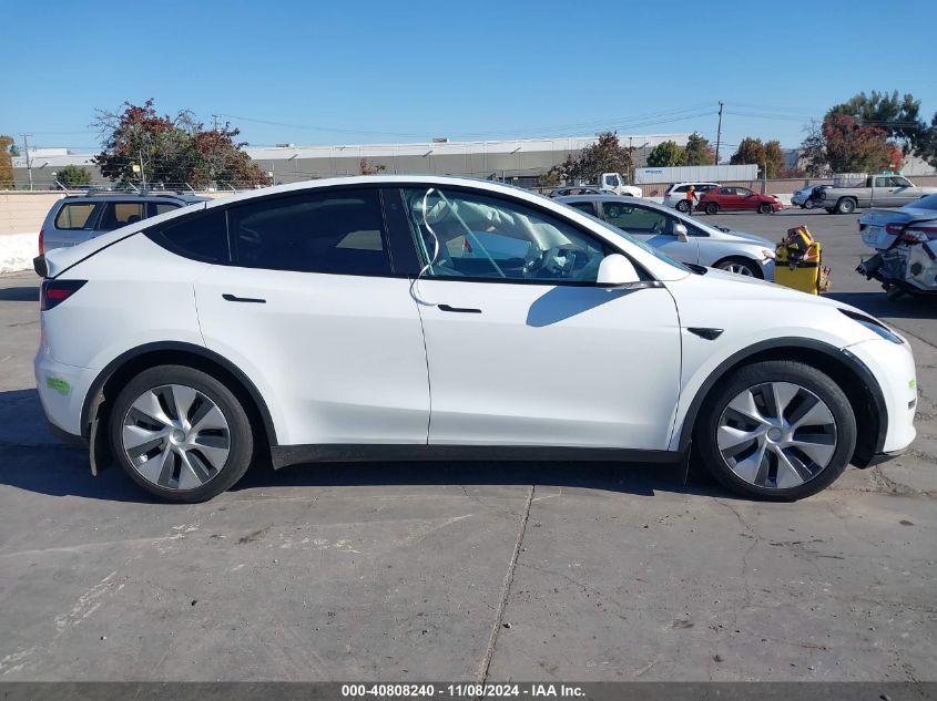 2023 Tesla Model Y Awd/Long Range Dual Motor All-Wheel Drive VIN: 7SAYGDEE0PF746909 Lot: 40808240