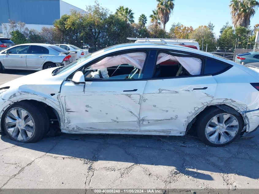 2023 Tesla Model Y Awd/Long Range Dual Motor All-Wheel Drive VIN: 7SAYGDEE0PF746909 Lot: 40808240