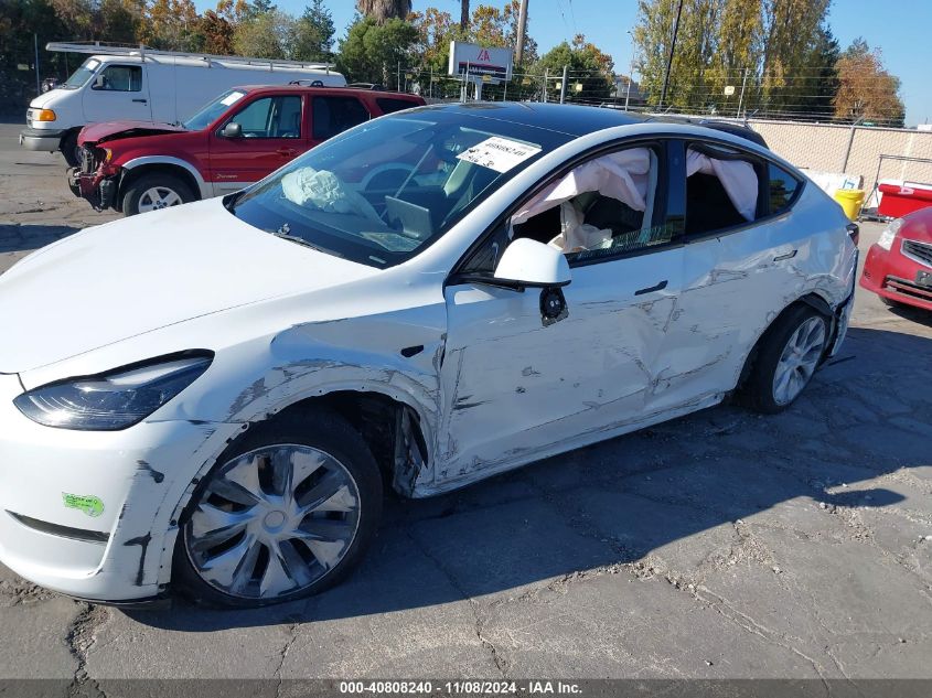 2023 Tesla Model Y Awd/Long Range Dual Motor All-Wheel Drive VIN: 7SAYGDEE0PF746909 Lot: 40808240