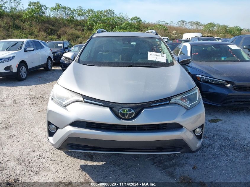 VIN 2T3WFREV7JW511400 2018 Toyota RAV4, Adventure/Xle no.13