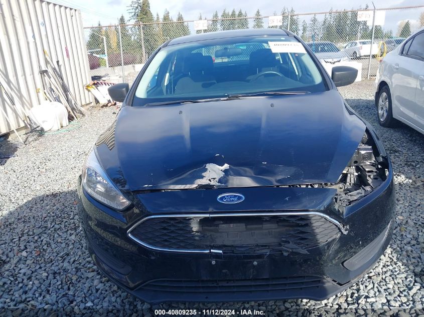 2018 Ford Focus S VIN: 1FADP3E21JL279280 Lot: 40809235