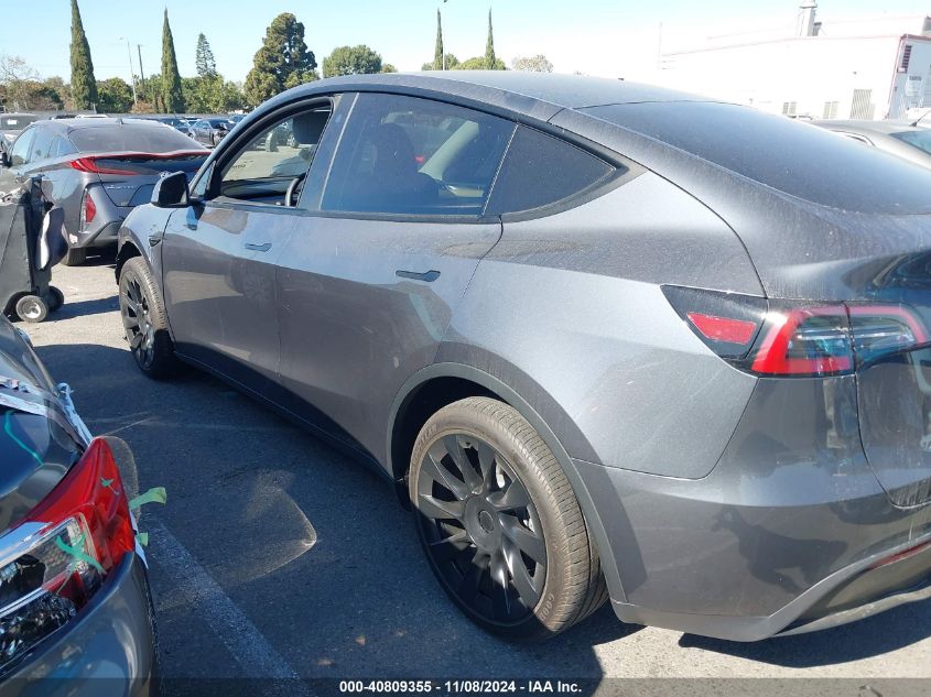 2023 Tesla Model Y Awd/Long Range Dual Motor All-Wheel Drive VIN: 7SAYGDEE9PA055942 Lot: 40809355