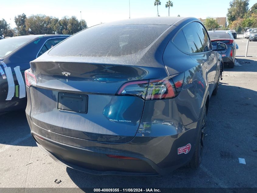 2023 Tesla Model Y Awd/Long Range Dual Motor All-Wheel Drive VIN: 7SAYGDEE9PA055942 Lot: 40809355