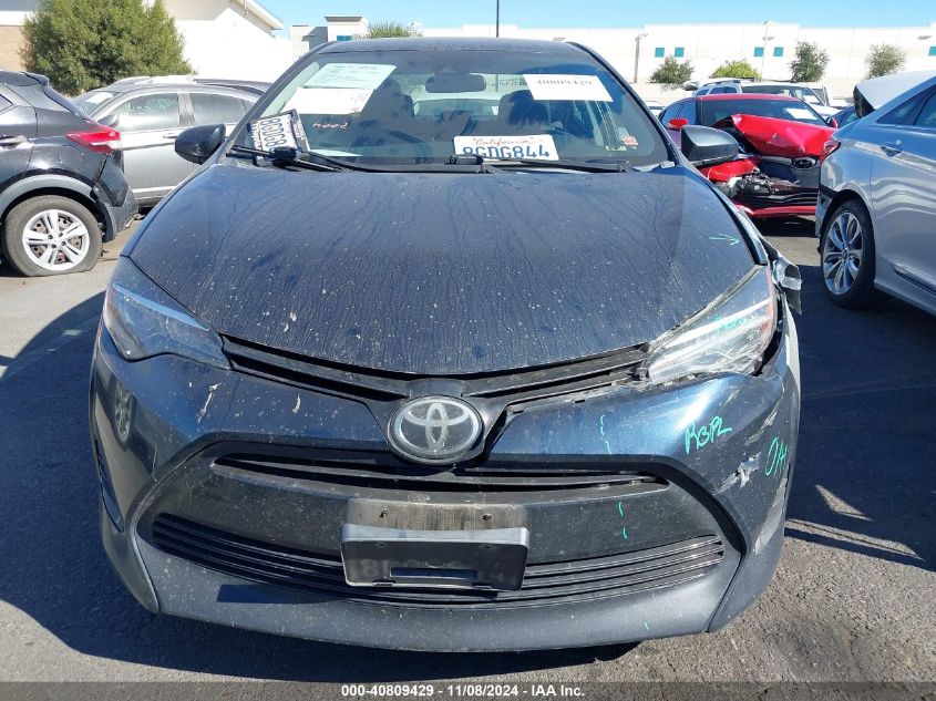 2019 Toyota Corolla Le VIN: 5YFBURHE6KP895486 Lot: 40809429