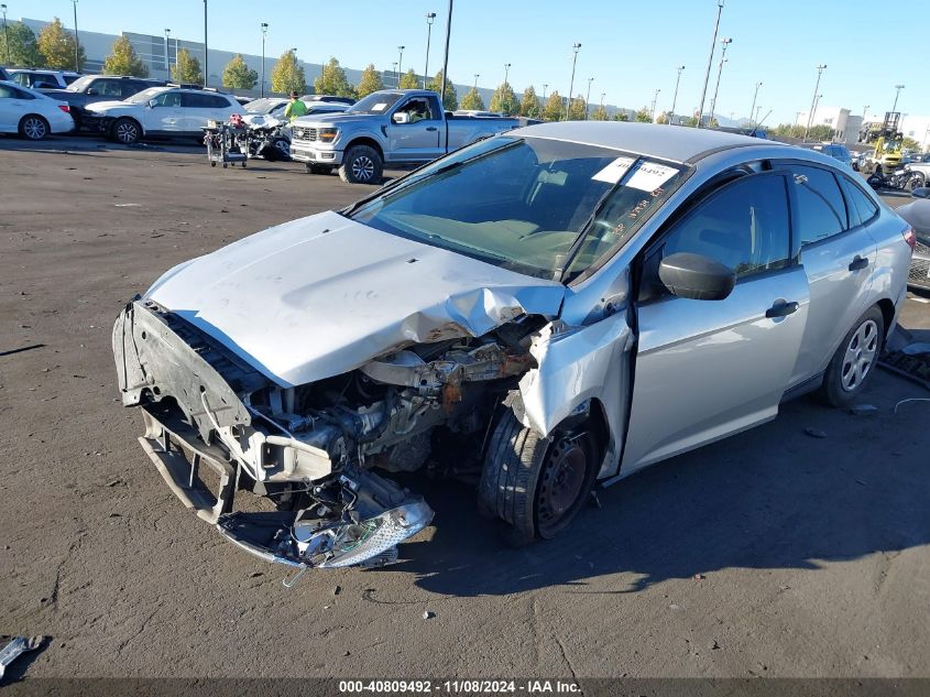 2018 Ford Focus S VIN: 1FADP3E21JL205244 Lot: 40809492