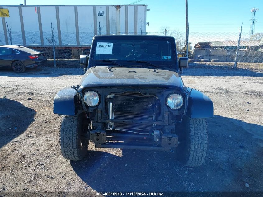 2013 Jeep Wrangler Freedom Edition VIN: 1C4GJWAG5DL566380 Lot: 40810918