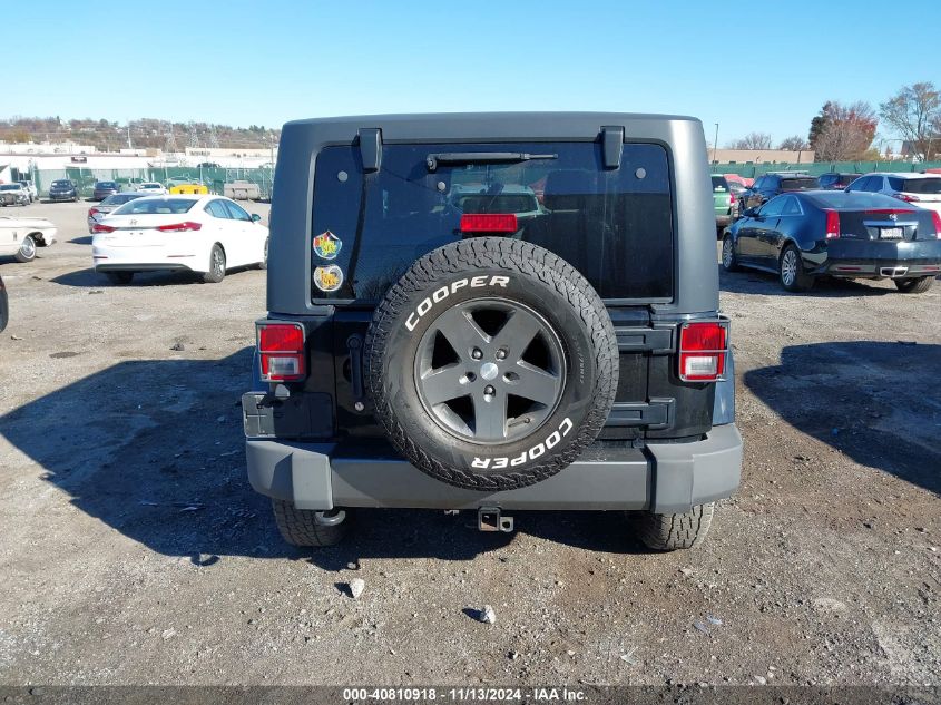 2013 Jeep Wrangler Freedom Edition VIN: 1C4GJWAG5DL566380 Lot: 40810918