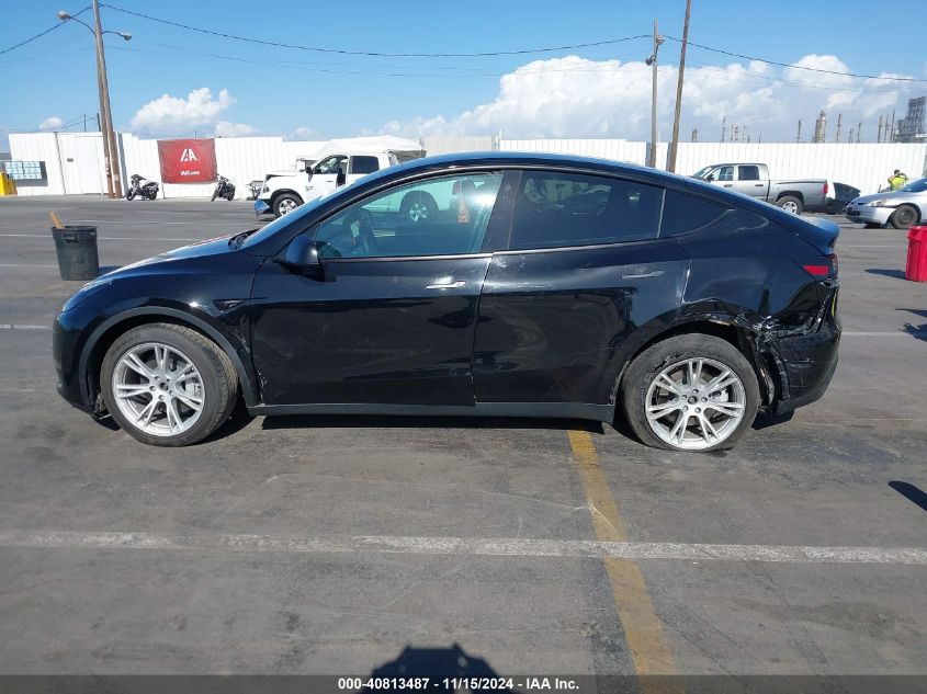 2023 Tesla Model Y Awd/Long Range Dual Motor All-Wheel Drive VIN: 7SAYGAEE8PF769580 Lot: 40813487