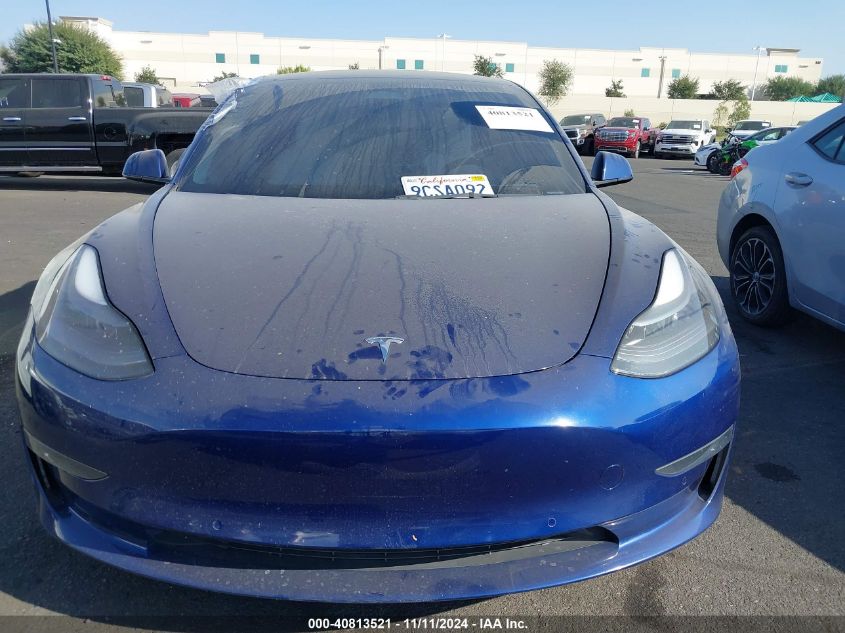 2022 Tesla Model 3 Long Range Dual Motor All-Wheel Drive VIN: 5YJ3E1EB6NF325811 Lot: 40813521