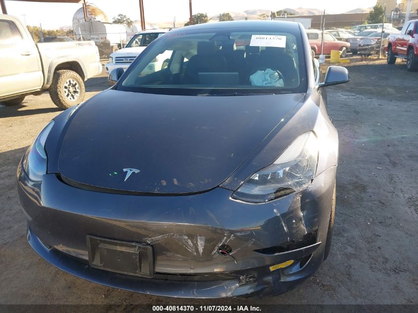 2022 Tesla Model 3 Long Range Dual Motor All-Wheel Drive VIN: 5YJ3E1EBXNF170518 Lot: 40814370