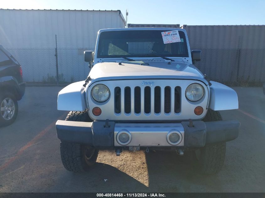 2008 Jeep Wrangler Unlimited Sahara VIN: 1J4GA59158L576322 Lot: 40814468