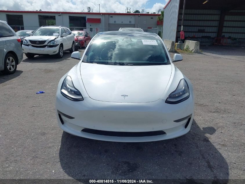 2021 Tesla Model 3 Standard Range Plus Rear-Wheel Drive VIN: 5YJ3E1EA8MF852111 Lot: 40814515