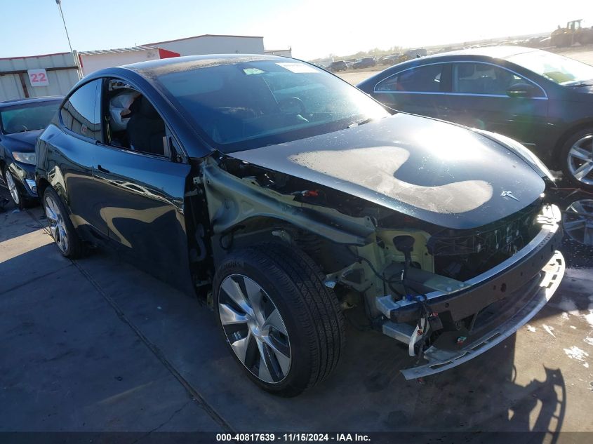 2023 Tesla Model Y Awd/Long Range Dual Motor All-Wheel Drive VIN: 7SAYGAEE4PF797666 Lot: 40817639