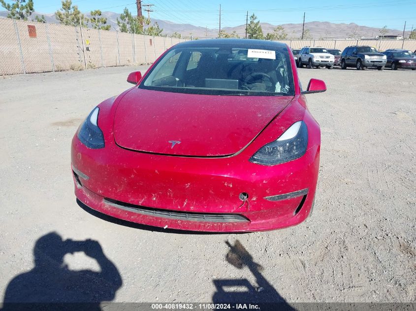 2023 Tesla Model 3 Long Range Dual Motor All-Wheel Drive VIN: 5YJ3E1EB2PF670546 Lot: 40819432