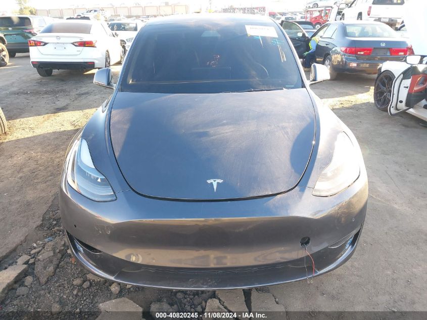 2021 Tesla Model Y Standard Range Rear-Wheel Drive VIN: 5YJYGDED2MF110296 Lot: 40820245