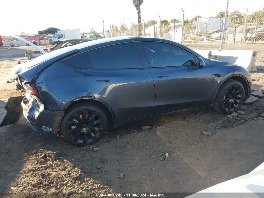 2021 Tesla Model Y Standard Range Rear-Wheel Drive VIN: 5YJYGDED2MF110296 Lot: 40820245