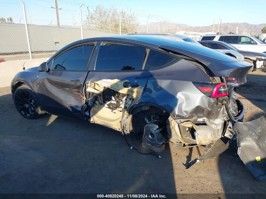 2021 Tesla Model Y Standard Range Rear-Wheel Drive VIN: 5YJYGDED2MF110296 Lot: 40820245