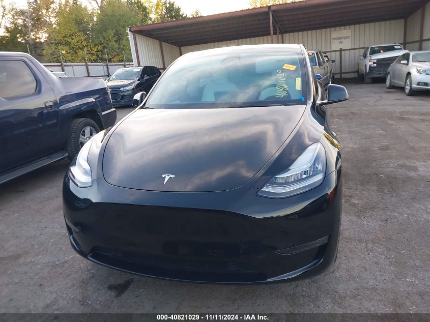 2023 Tesla Model Y Awd/Long Range Dual Motor All-Wheel Drive VIN: 7SAYGAEE7PF599180 Lot: 40821029