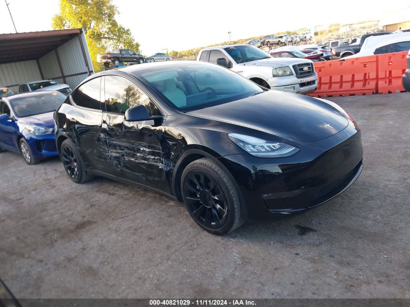 2023 Tesla Model Y Awd/Long Range Dual Motor All-Wheel Drive VIN: 7SAYGAEE7PF599180 Lot: 40821029