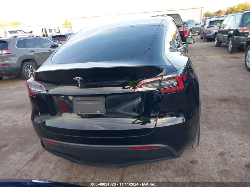 2023 Tesla Model Y Awd/Long Range Dual Motor All-Wheel Drive VIN: 7SAYGAEE7PF599180 Lot: 40821029