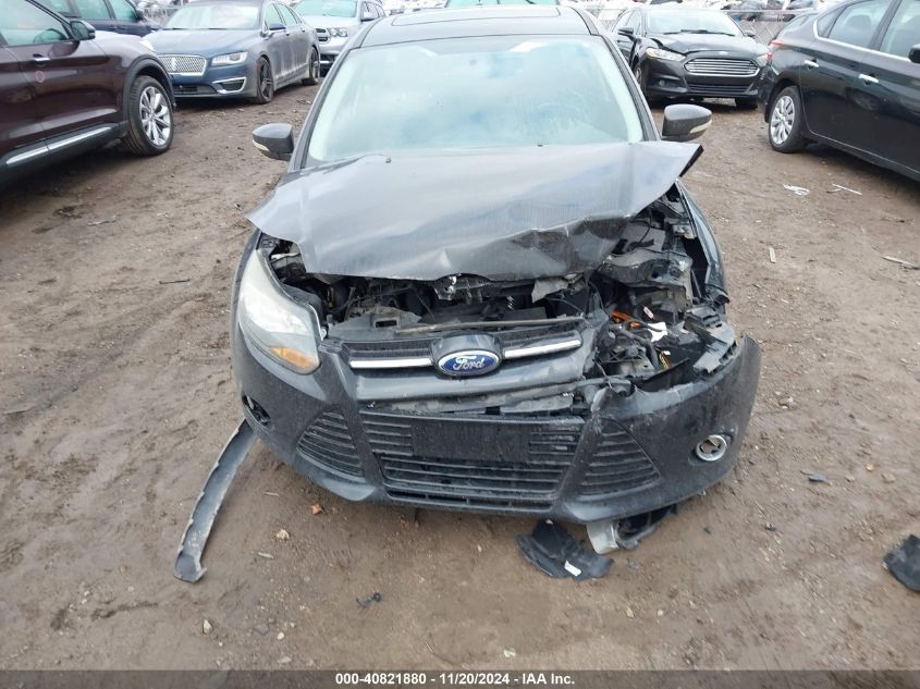 2014 Ford Focus Titanium VIN: 1FADP3N23EL297642 Lot: 40821880