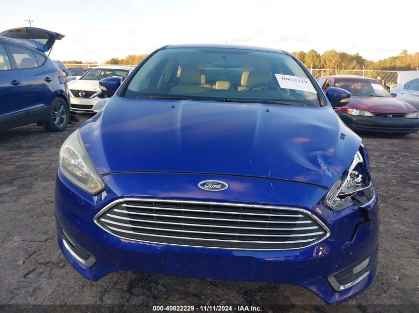 2015 Ford Focus Titanium VIN: 1FADP3N27FL365989 Lot: 40822229