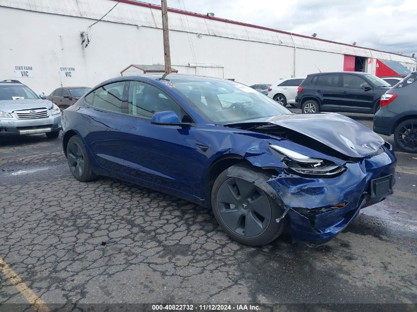 VIN 5YJ3E1EA6PF590450 2023 Tesla Model 3, Rear-Whee... no.1