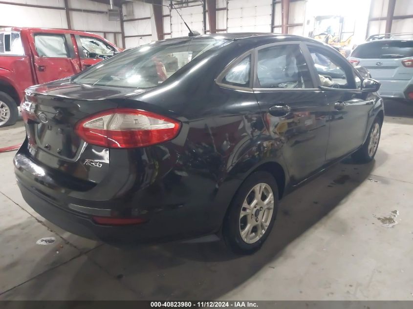 VIN 3FADP4BJ5EM139786 2014 FORD FIESTA no.4