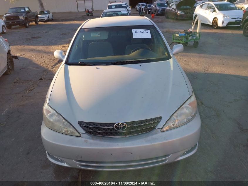 2003 Toyota Camry Le VIN: JTDBE32KX30155069 Lot: 40826184