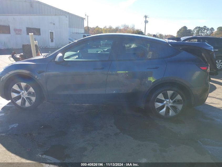 2023 Tesla Model Y Awd/Long Range Dual Motor All-Wheel Drive VIN: 7SAYGDEE0PF708452 Lot: 40826196