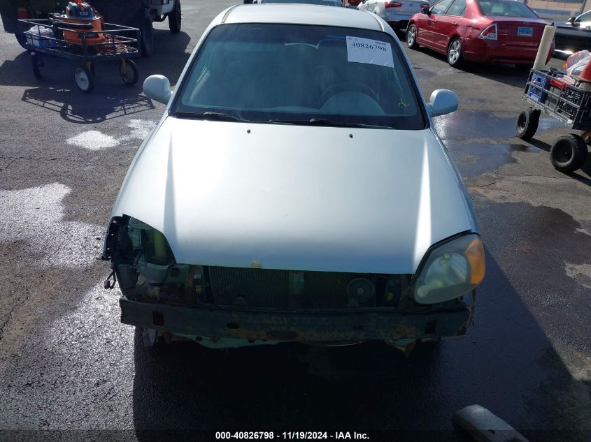 2004 Hyundai Accent Gl/Gt VIN: KMHCG35C14U314148 Lot: 40826798