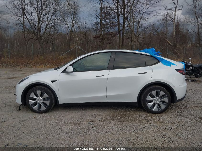 2023 Tesla Model Y Awd/Long Range Dual Motor All-Wheel Drive VIN: 7SAYGDEE1PA173984 Lot: 40829456