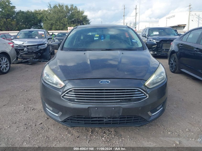 2015 Ford Focus Titanium VIN: 1FADP3N24FL338409 Lot: 40831168