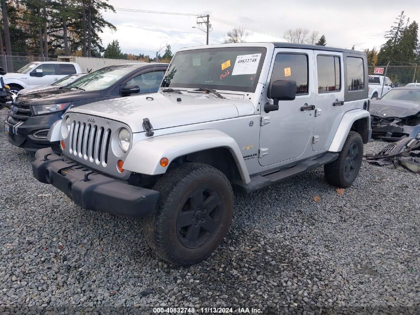 2007 Jeep Wrangler Unlimited Sahara VIN: 1J4GA591X7L175752 Lot: 40832748