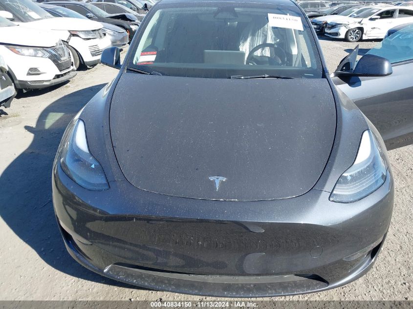 2024 Tesla Model Y Performance Dual Motor All-Wheel Drive VIN: 7SAYGDEF0RF051809 Lot: 40834150