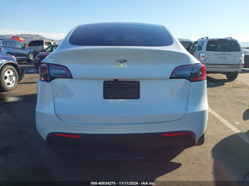 2024 Tesla Model Y Long Range Dual Motor All-Wheel Drive/Rwd VIN: 7SAYGDED1RF098104 Lot: 40834270