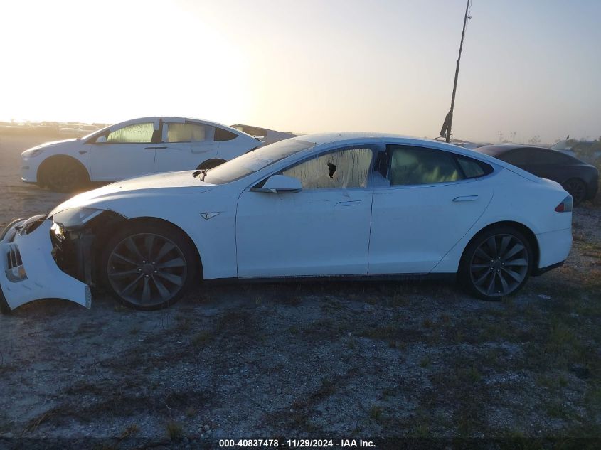 2014 Tesla Model S VIN: 5YJSA1S11EFP30431 Lot: 40837478