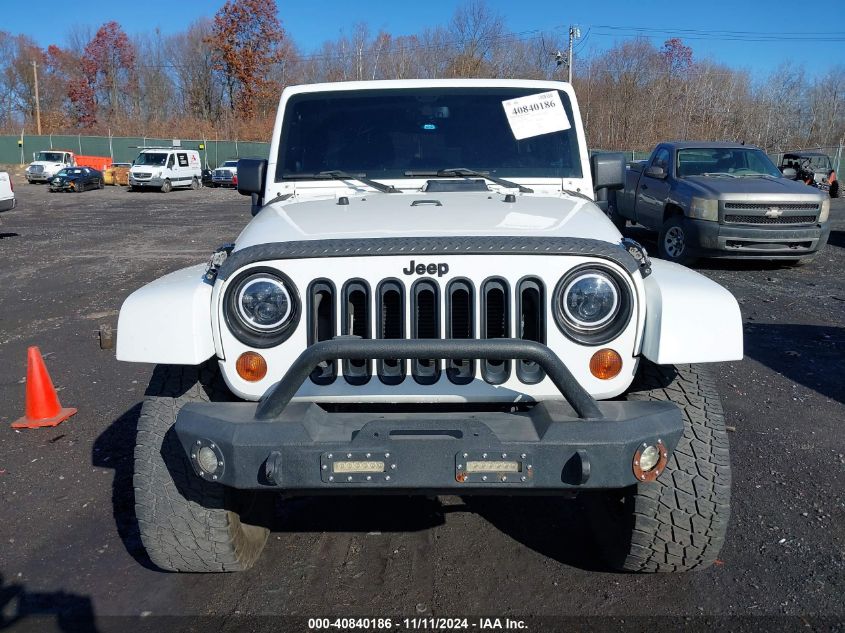 2013 Jeep Wrangler Unlimited Sahara VIN: 1C4HJWEG0DL704809 Lot: 40840186