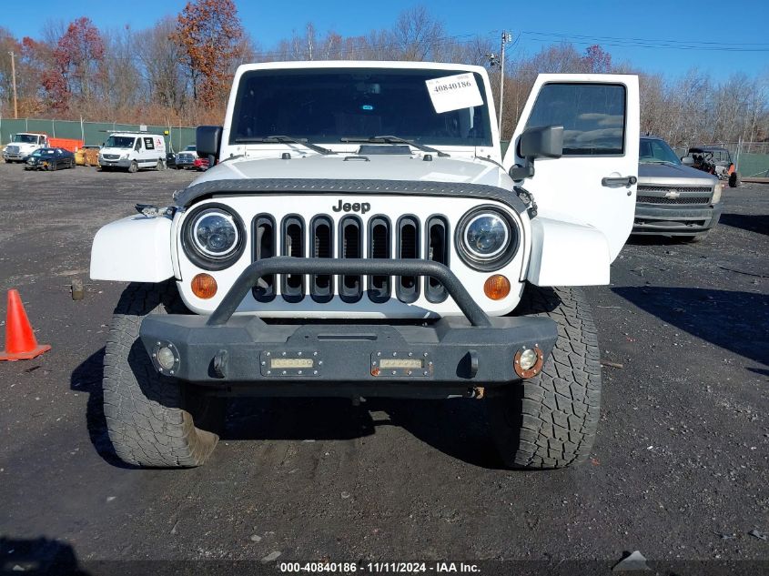 2013 Jeep Wrangler Unlimited Sahara VIN: 1C4HJWEG0DL704809 Lot: 40840186